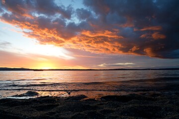 Dramatic Red Sunset Sky over Pt Chevalier Beach