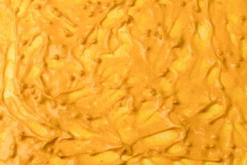Yellow sauce splashes as a background.