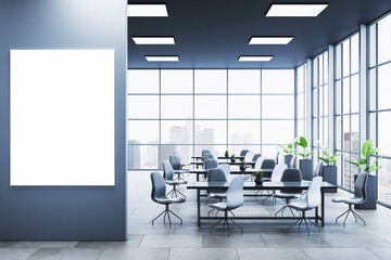 Blank vertical poster on dark wall in modern office with glass windows and city view, showcasing clean corporate workspace with creative layout. 3D Rendering