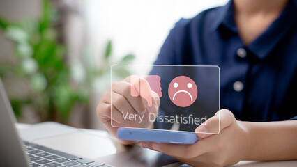 Customer giving very dissatisfied feedback via smartphone, highlighting negative experience,...