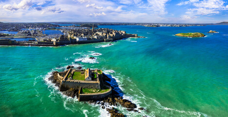 France travel and landmarks. aerial panoramic view of Saint -Malo , historic French port in Ille-et-Vilaine, Brittany. drone view of old city and national fort on the island