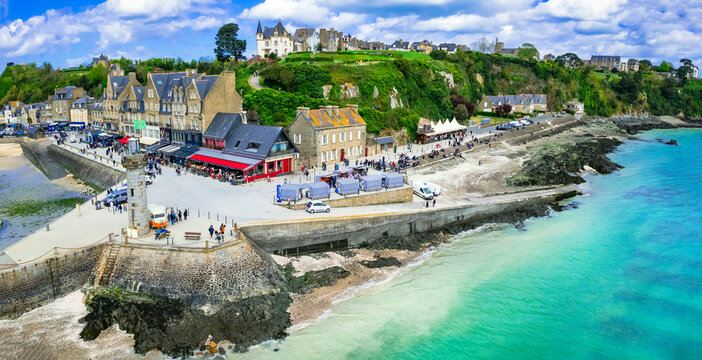 Cancale Brittany France aerial drone Scenic view of oyster capital waterfront in Bretagne with emerald coast Lighthouse and traditional harbor. Famous French travel destination