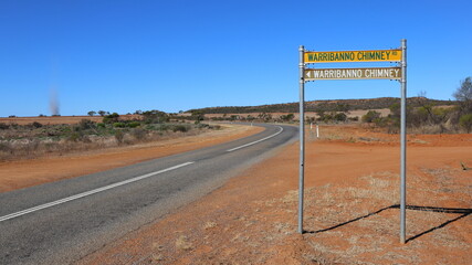Road sign. Warribanno chimney, smelter ruins.  Constructed 1849 to 1851. Near Kalbarri and...