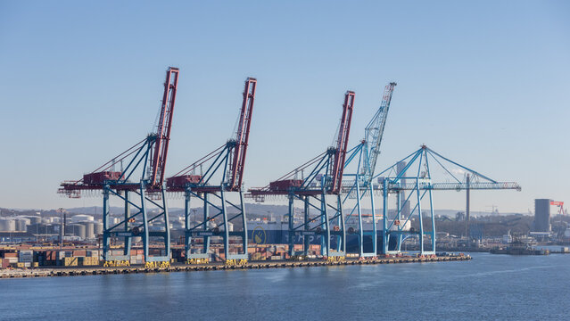 Gothenburg / Sweden, Mar 21, 2025: Line of gantry cranes at the container terminal, Port of Gothenburg.