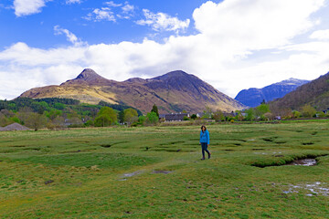Fototapeta premium Walking carefully across the plains where Loch Leven recedes into the sea.