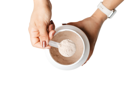 Woman's hands holding measuring spoon with whey protein powder over a jar, preparing a protein drink cocktail, top view, isolated on a transparent background