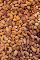 Mix of different nuts, close-up. Natural background of different nuts