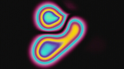 Abstract blurred colorful shape on dark background.This image is ideal for use as a unique backdrop, or artistic overlay