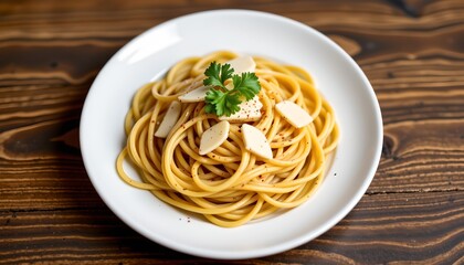 a plate of spaghetti with red sauce and cheese toppings on a wooden table.