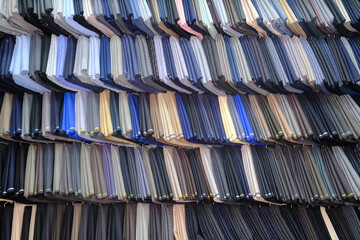 Custom tailoring workshop for men with a large selection of fabrics.