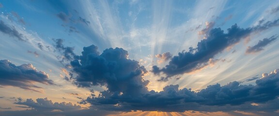 Majestic Sunset Sky: Dramatic Clouds and Crepuscular Rays at Golden Hour
