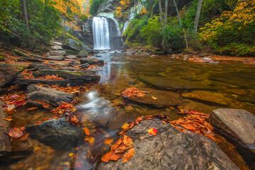 Linville Falls in the autumn in North Carolina with colorful leaves turning
