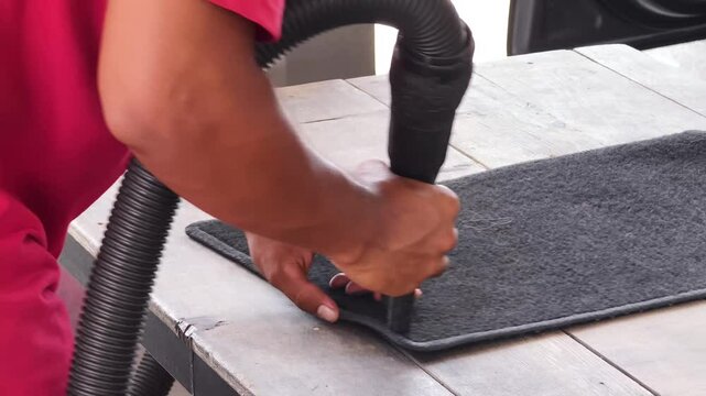 The professional car carpet cleaning process in action ensuring a spotless and fresh appearance