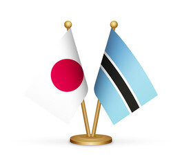 Japan vs Botswana flags mockup 3d illustration. Versus desk flags of Japan and Botswana transparent png