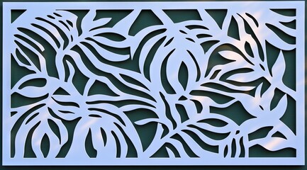 Decorative laser-cut panel with stylized tropical leaves