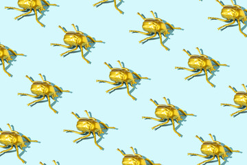 Golden bugs pattern on pastel blue background.