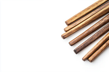 Obraz premium Cinnamon sticks arranged on white background for food or spice display