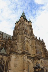 Fototapeta premium Old Catholic stone church in Gothic style. Church in Prague, Czech republic