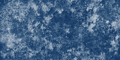 Rough Blue Texture with High-Contrast White Shape in Central Composition

