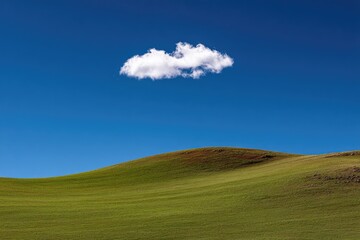 Peaceful Horizon with Cloud Above Rolling Hills