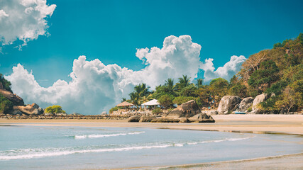 Canacona, Goa, India. Sunny Sky Over Calm Water Of Arabian Sea. Natural Landscape With Sandy Palolem Beach At Sunny Summer Day With Blue Sky