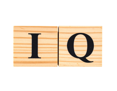 Two wooden tiles display the letters "I" and "Q" in bold black font.