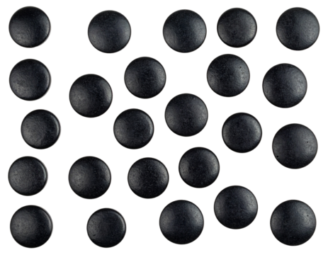 Multiple round, black tablets arranged in a grid pattern.