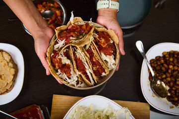 Delicious Homemade Tacos Served with Fresh Salsa and Sides