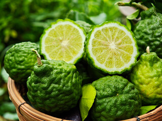 Fototapeta premium Green bergamot in the wooden basket