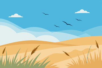 sand dunes with tall grasses under a clear sky 