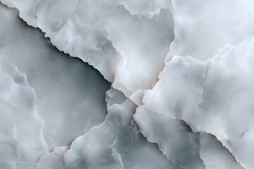 Obraz premium Abstract pattern in shades of white, gray, and blue resembling marble, mineral, or stone for backgrounds and design elements.