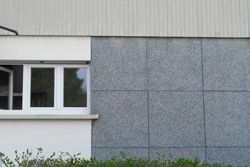 granite slabs on facade of a modern house