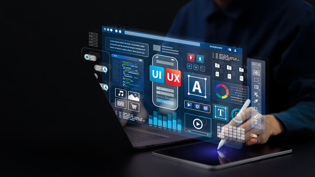 Web UI-UX design, web development concept. A web developer works on a website to develop mobile and laptop app interface. User interface and experience.  application design. User experience. coding.