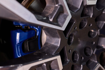 An Up Close View of a Stylish and Contemporary Car Wheel Featuring a Sporty Caliper