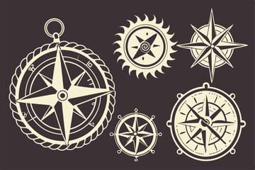 Vector set of vintage nautical compass icons, perfect for travel, navigation, and sport designs, illustrating directions north, south, east, and west with a retro feel