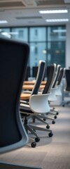 Fototapeta premium row of chairs sitting next to each other in a room