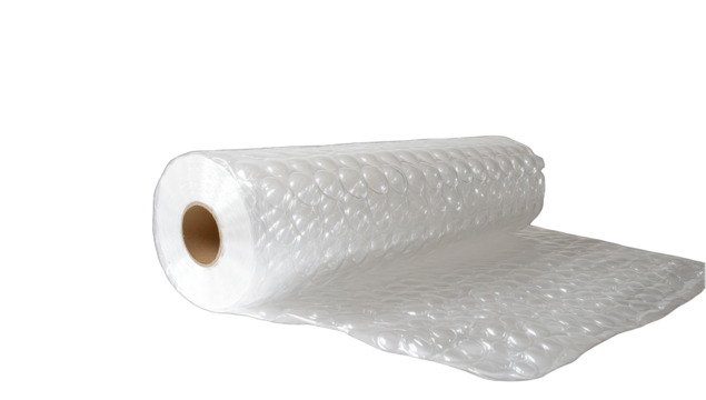 A roll of translucent bubble wrap, partially unrolled, displaying its cushioning air pockets and cardboard core