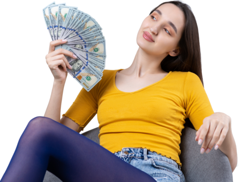 Photo of a wealthy woman in simple clothes holding a fan of dollar money isolated against a concrete wall background