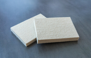 Felt squeegee for vinyl film.A film gluer's tool.The sheet felt is white.