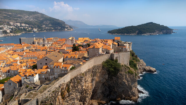 Aerial view of St. Peter fort in Dubrovnik city, Croatia. Cityscape with fortification on cliff above Adriatic sea on sunny summer day