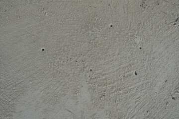 Textured Light Gray Concrete Surface with Minor Flaws and Natural Patterns for Background Use