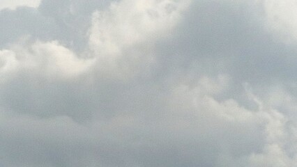 Cloudy skies paint the atmosphere with softness and subtle drama, diffusing light and muting the...