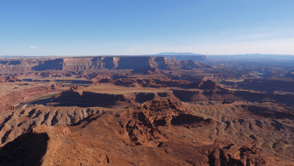 Panorama picturesque Grand Canyon in western United States in national park. Colorado river eroded channel in sandstone. View observation point for traveling tourists. Red rocks of Dead Horse Canyon