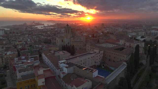 Catedral de Tarragona, Aerial view at Sunset Time with dramatic sky. Coastal City of Tarragona, Catalonia, Spain. 