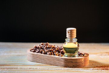 Clove Grains and Medicinal Clove Oil In a Bottle