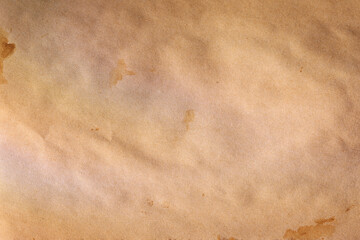 Aged journal paper illuminated by rainbow prism light