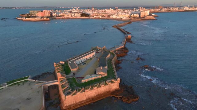 Castillo de San Sebastian, Beautiful Castle in Cadiz, Connected with a Bridge. Sunset view of Cadiz, Andalusia, Spain