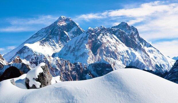 Fototapeta Top of Mount Everest and Lhotse peak as seen from Gokyo valley with snow drift blue colored, way to Mt Everest base camp, Nepal Himalaya mountain