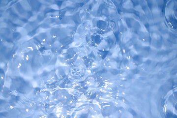Calm Water Surface with Soft Ripples and Light Reflections