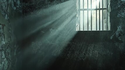 Dim light streams through a barred window in a dark prison cell - Powered by Adobe